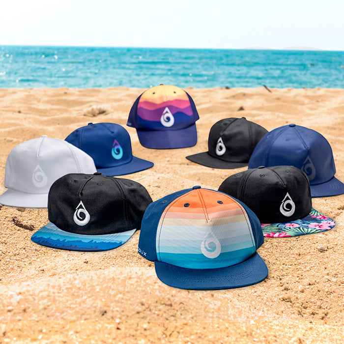 Surf caps on the beach, 8 different designs