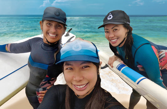 Girls wearing surf hats after a surf session 7