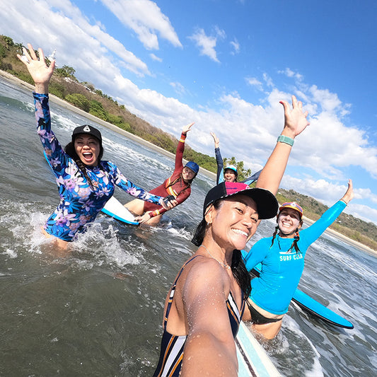 Surf girls wearing surf caps 1